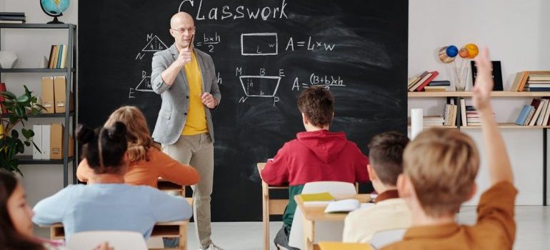 Teacher and kids in the classroom