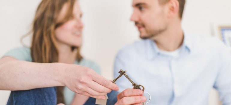 couple sitting after moving into a new home