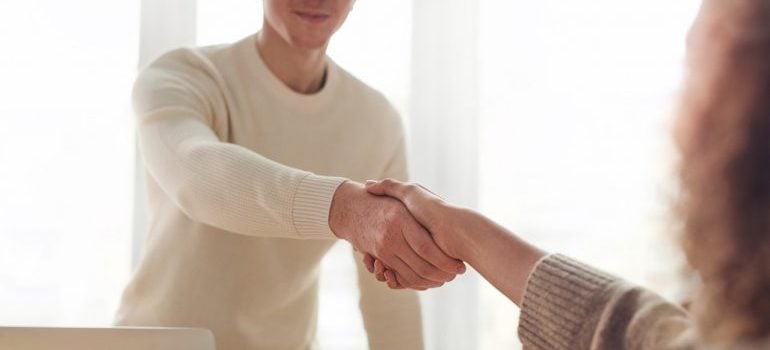Two people shaking hands