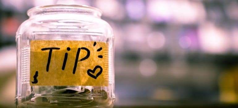 using a jar to tip your Arlington movers