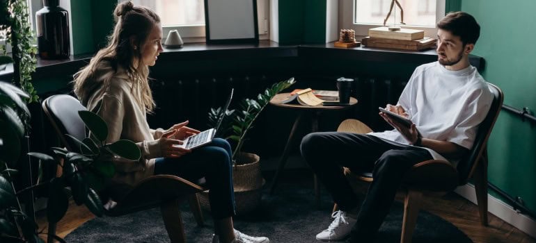 Young newlyweds working from home