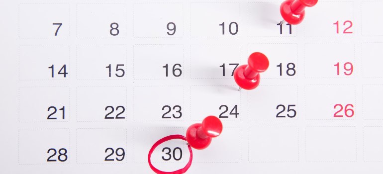 a calendar to organize when booking a moving service online for your move in Manassas