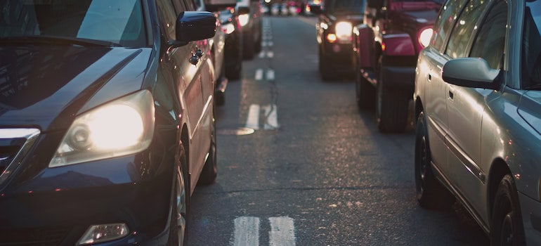 Cars on the street, Traffic congestion, one of the cons of moving to Burke