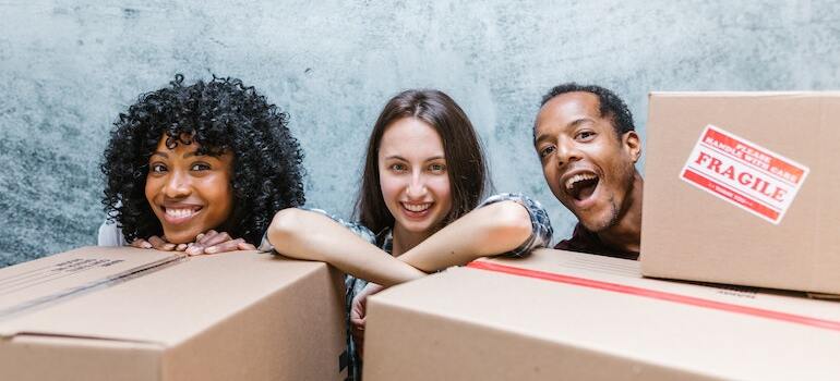 Friends having fun while packing 