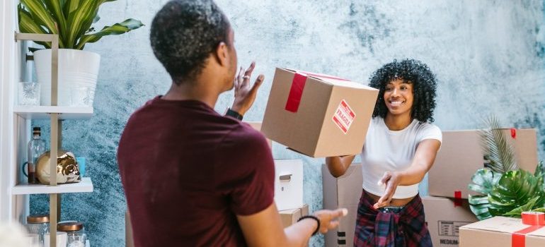 A couple goofing around with boxes before After moving to Northern Virginia, you will easily fall in love with any city there.