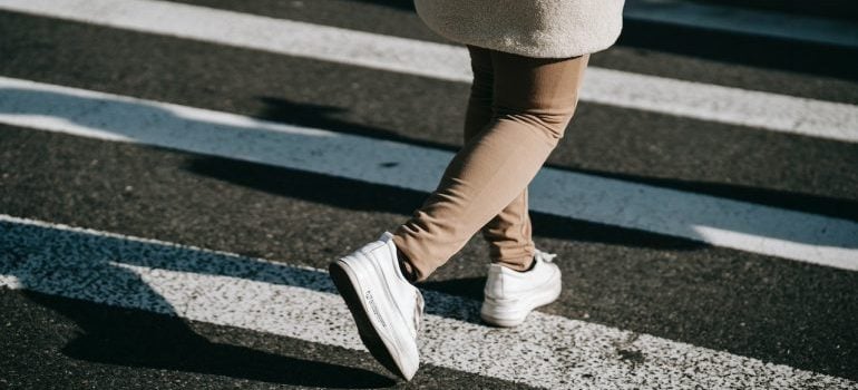 A girl crossing the street
