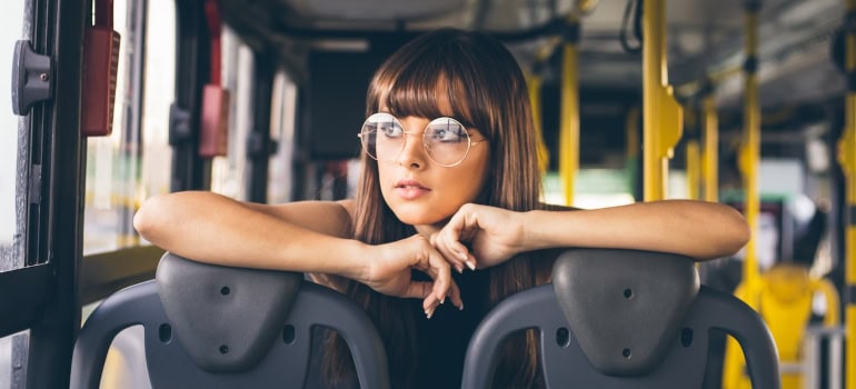 A woman on a bus.