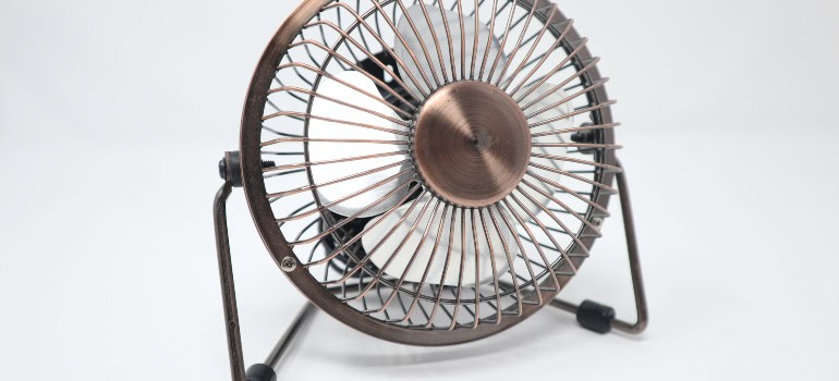 a silver portable fan