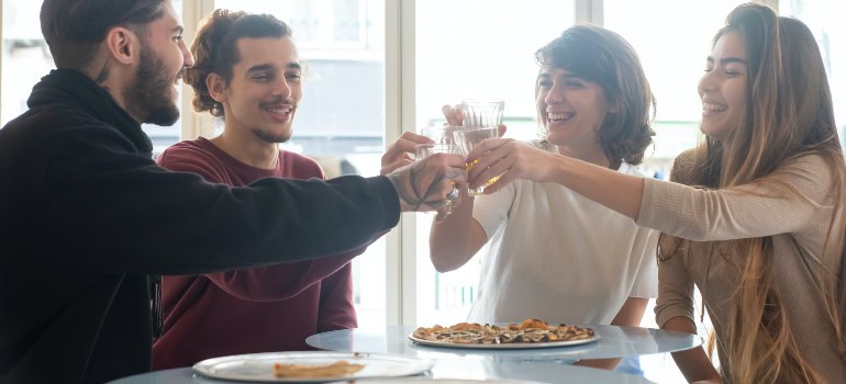 several people happily hanging out together after moving from Arlington to Burke