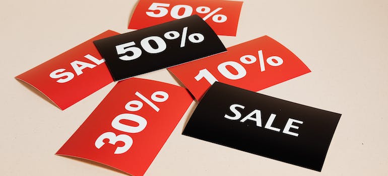 several black and red cards with various percentages displayed on them