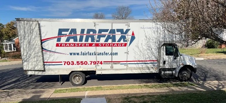 a truck with the logo of Fairfax Transfer and Storage on it