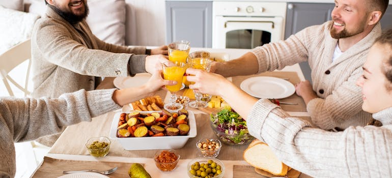 four people having lunch at home 