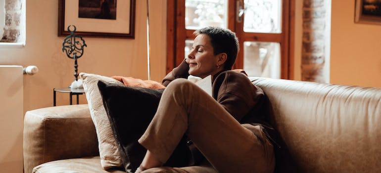 a woman relaxing on the couch