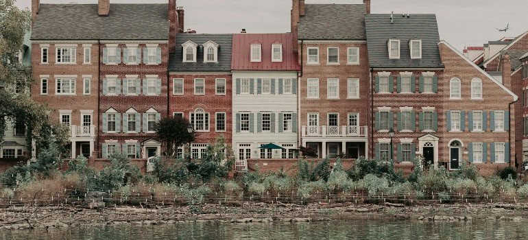 a set of buildings next to the river at one of the top cities to move to in Fairfax County