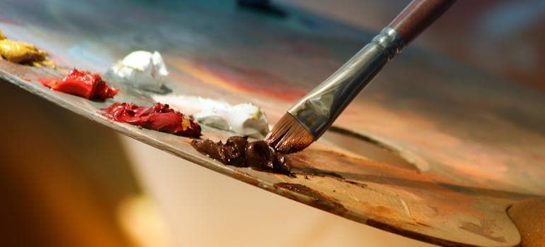 a close-up of a paintbrush and some paint