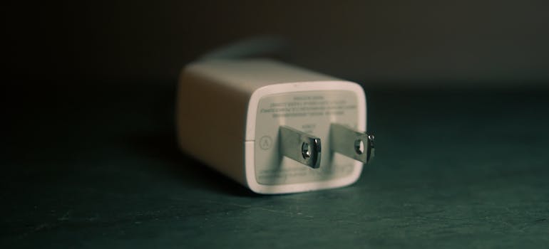 an adapter for plugging the devices into electric sockets