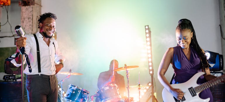 a band made of three members, each playing a different instrument