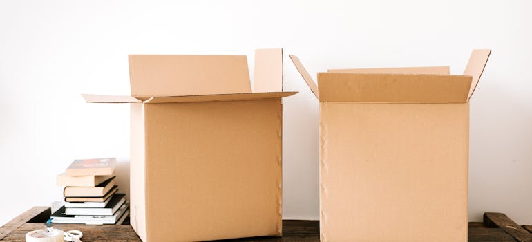 two cardboard boxes which you may need to pack your home book library for a move