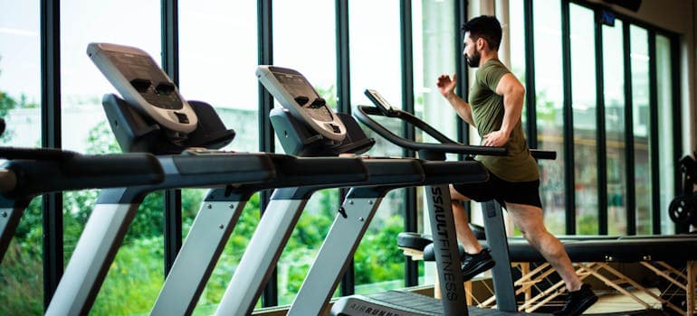 a man running on a treadmill in an effort to live a fulfilling life in Quantico VA