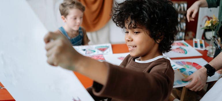 several kids in an art class at school