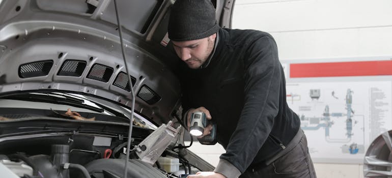 a man fixing someone's broken car which should be counted as an irregular expense when you calculate living expenses