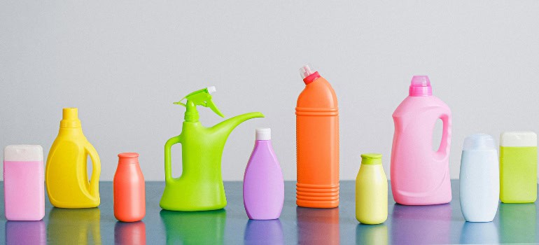 various plastic bottles in which cleaning products are usually sold