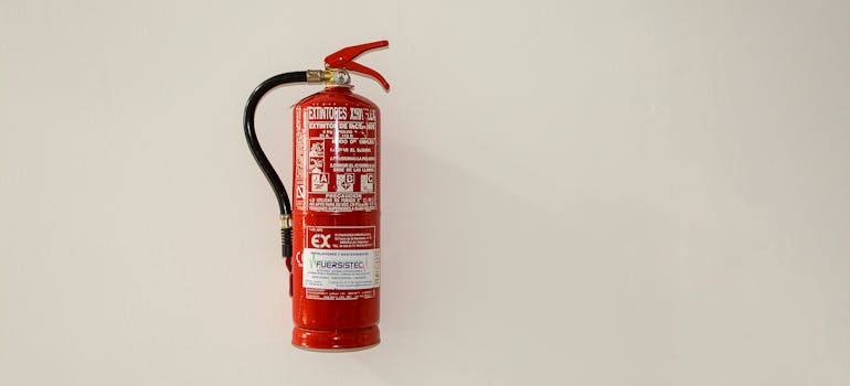 a fire extinguisher mounted on a wall