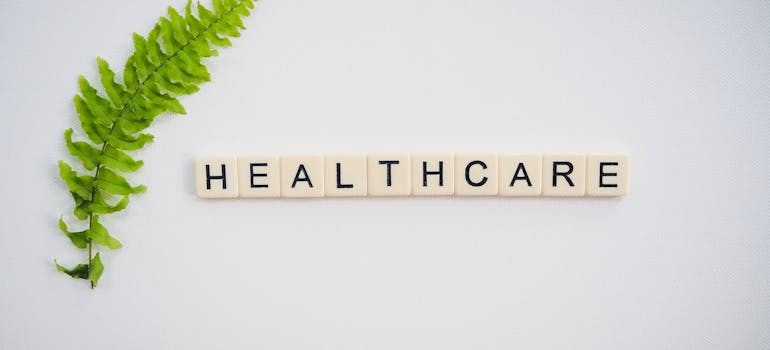 healthcare, written with Scrabble tiles